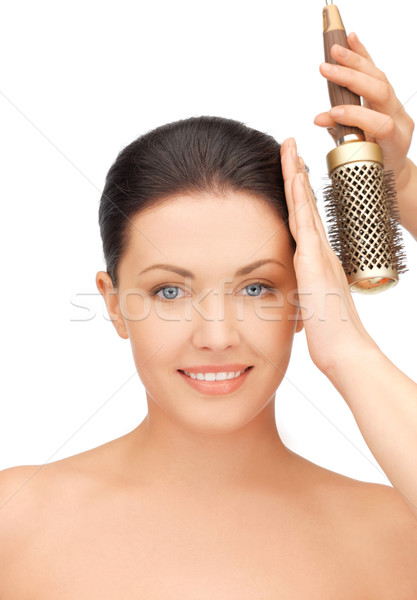 beautiful woman with comb Stock photo © dolgachov