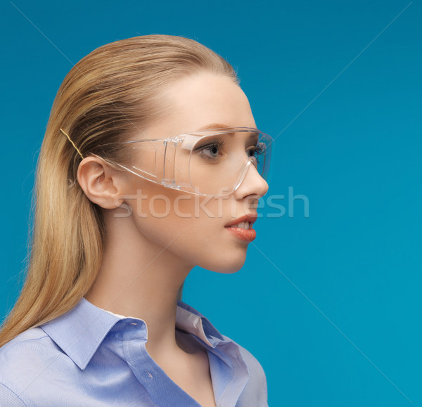 Stock photo: businesswoman in protective glasses