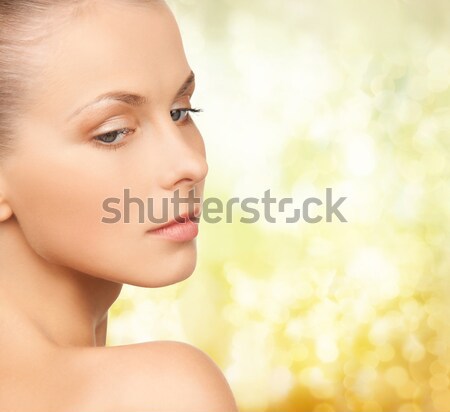 Mulher tocante ouvido saúde beleza Foto stock © dolgachov