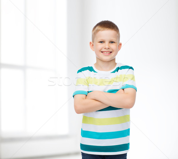 little boy in casual clothes with arms crossed Stock photo © dolgachov