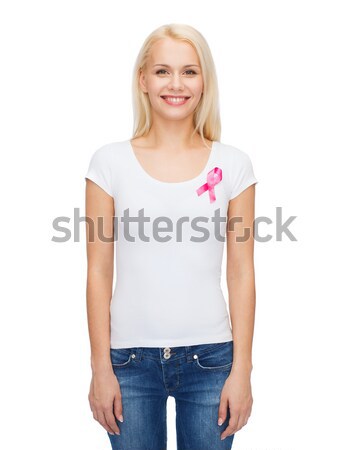 Uśmiechnięta kobieta różowy raka świadomość wstążka opieki zdrowotnej Zdjęcia stock © dolgachov