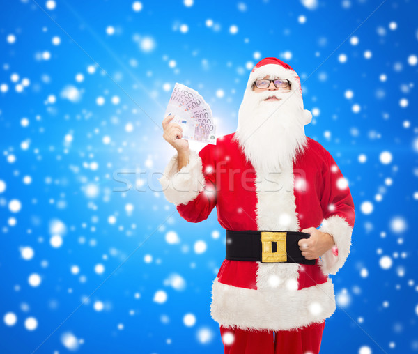 ストックフォト: 男 · 衣装 · サンタクロース · ユーロ · お金 · クリスマス