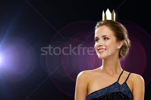 Mosolygó nő estélyi ruha visel korona emberek ünnepek Stock fotó © dolgachov