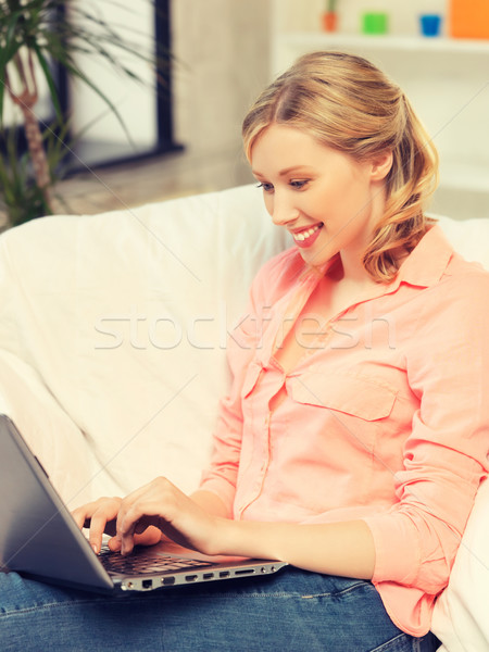 woman with laptop typing  at home Stock photo © dolgachov