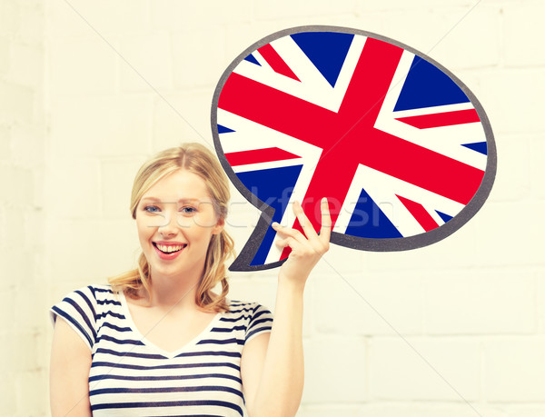smiling woman with text bubble of british flag Stock photo © dolgachov