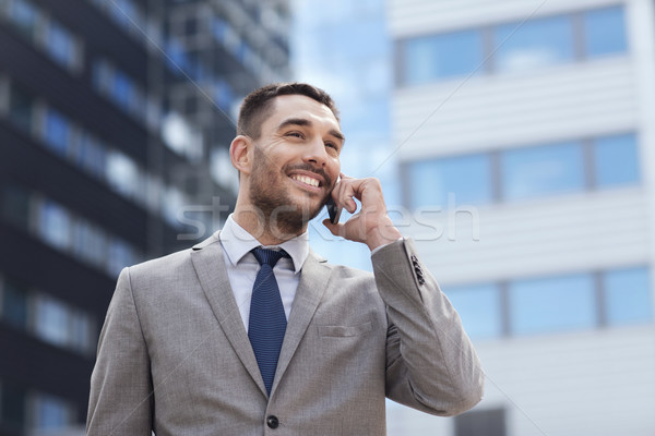 Foto stock: Sorridente · empresário · ao · ar · livre · negócio · tecnologia