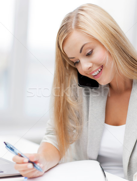 Empresária telefone falante mulher caneta Foto stock © dolgachov