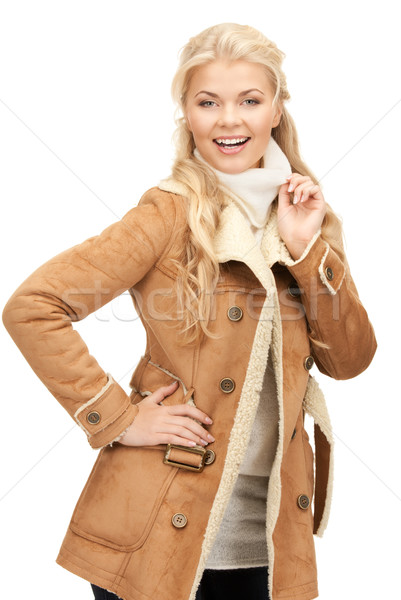 beautiful woman in sheepskin jacket Stock photo © dolgachov
