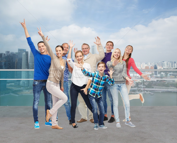 group of smiling people having fun Stock photo © dolgachov