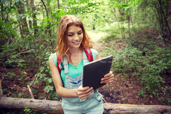 Heureux femme sac à dos bois aventure [[stock_photo]] © dolgachov