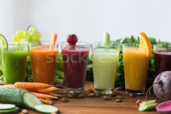 Stock photo: glasses with different fruit or vegetable juices