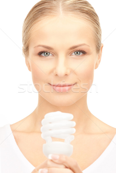 Nő tart energia takarékosság villanykörte fényes Stock fotó © dolgachov
