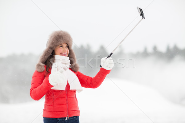 Stockfoto: Gelukkig · vrouw · stick · buitenshuis · winter · mensen