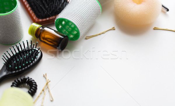 hair brushes, oil, curlers and pins Stock photo © dolgachov