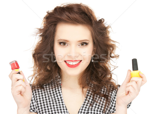 beautiful woman polishing her nails Stock photo © dolgachov