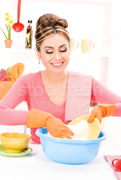 housewife washing dish Stock photo © dolgachov