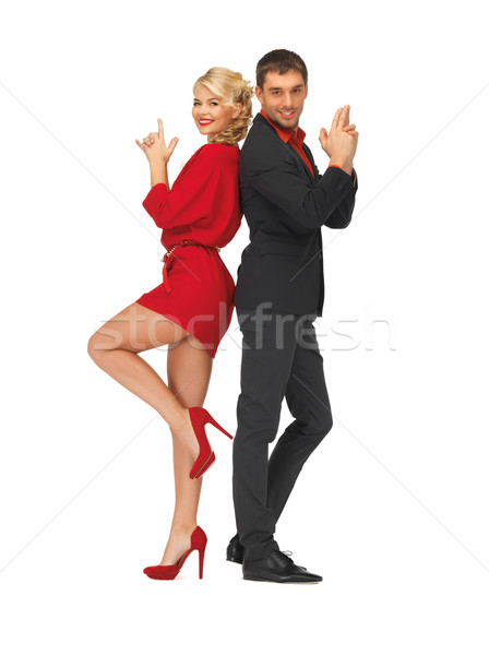 man and woman making a gun gesture Stock photo © dolgachov