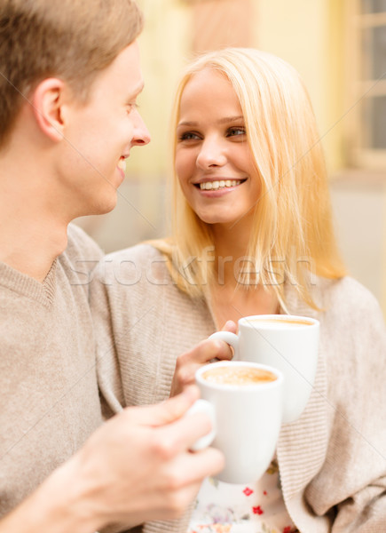 romantic happy couple in the cafe Stock photo © dolgachov