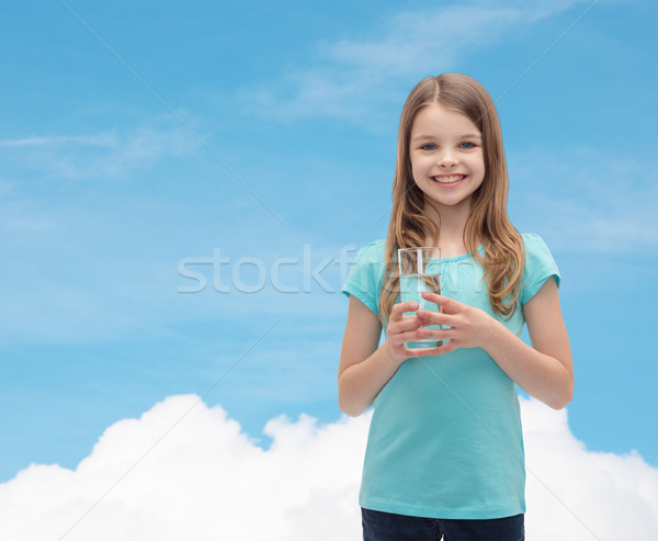 Gülen küçük kız cam su sağlık güzellik Stok fotoğraf © dolgachov