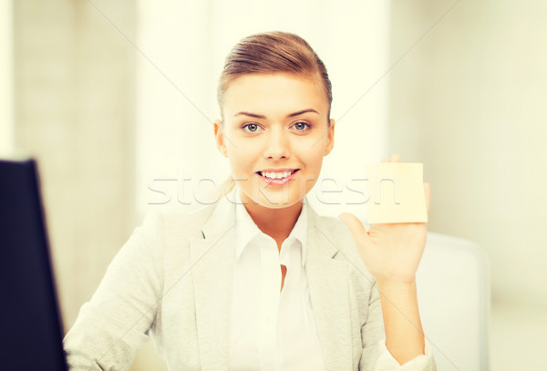 Sorridente empresária nota pegajosa quadro negócio Foto stock © dolgachov
