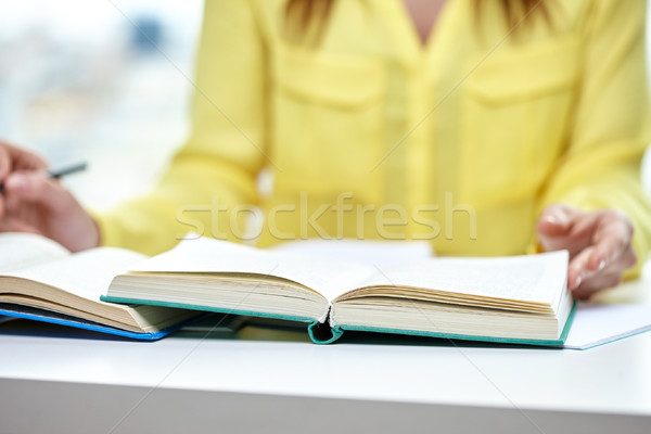 Femminile mani libro libro di testo persone Foto d'archivio © dolgachov