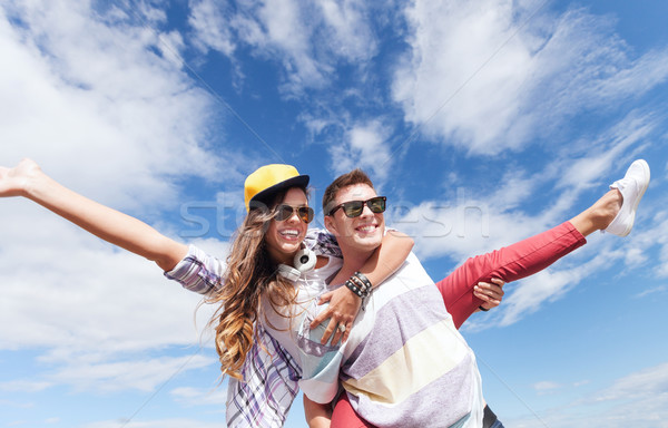 teenagers having fun outside Stock photo © dolgachov