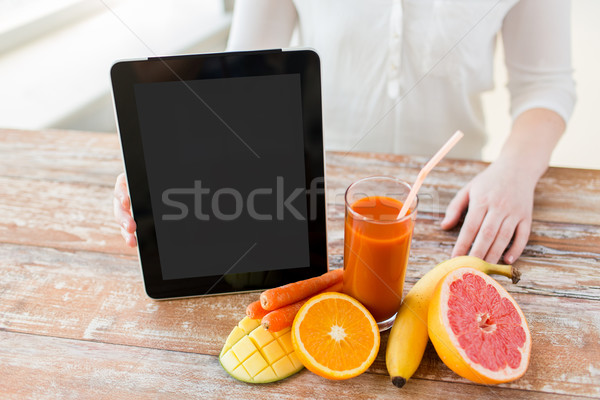 close up of woman hands with juice and fruits Stock photo © dolgachov