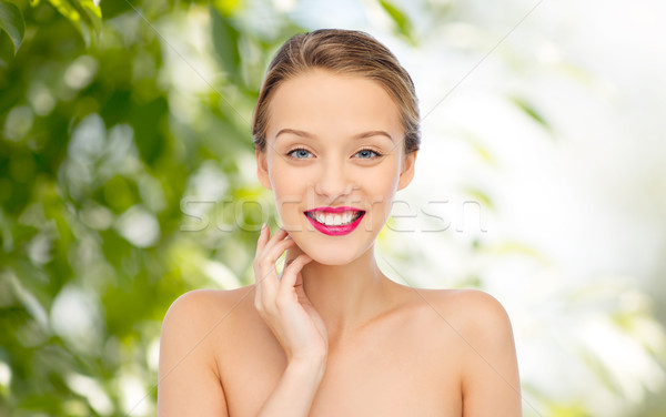 Glimlachend jonge vrouw roze lippenstift lippen schoonheid Stockfoto © dolgachov