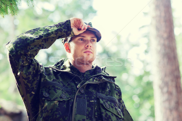 Jovem soldado floresta guerra exército pessoas Foto stock © dolgachov