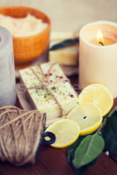 close up of natural soap and candles on wood Stock photo © dolgachov