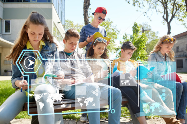 group of students with notebooks at school yard Stock photo © dolgachov