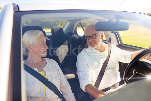happy senior couple driving in car Stock photo © dolgachov
