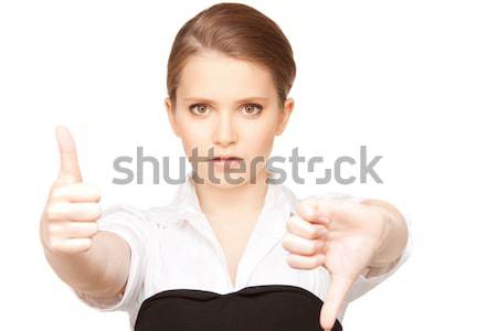 thumbs up and thumbs down Stock photo © dolgachov