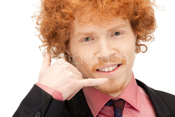 man making a call me gesture Stock photo © dolgachov