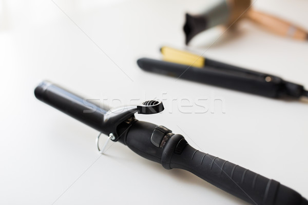 curling iron, hot styler and hairdryer Stock photo © dolgachov