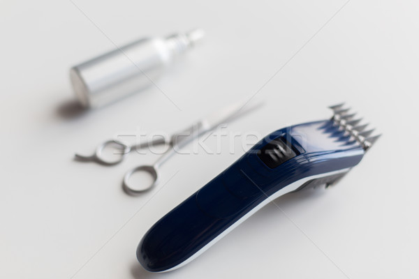 Stock photo: styling hair spray, trimmer and scissors
