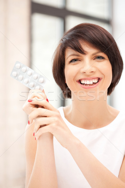 Jeunes belle femme pilules photos femme médicaux [[stock_photo]] © dolgachov