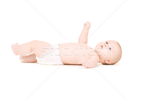 laying baby boy in diaper Stock photo © dolgachov