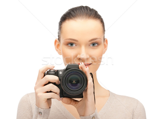 teenage girl with digital camera Stock photo © dolgachov