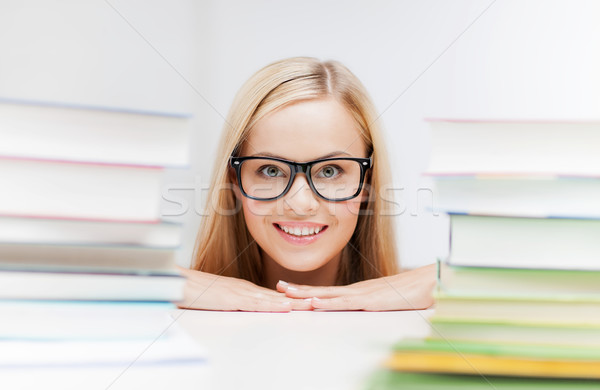 Student książek zdjęcie uśmiechnięty kobieta Zdjęcia stock © dolgachov