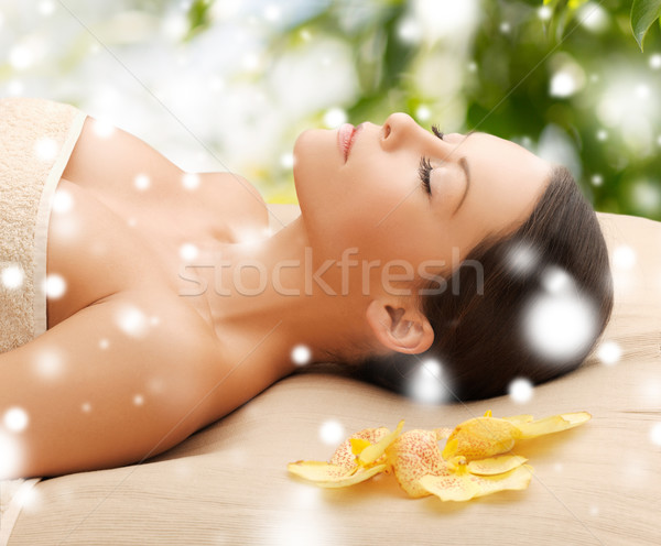 woman in spa lying on the massage desk Stock photo © dolgachov