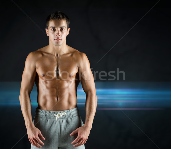 Fiatal férfi testépítő meztelen izmos törzs Stock fotó © dolgachov