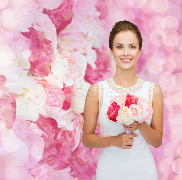 Stockfoto: Glimlachende · vrouw · witte · jurk · boeket · rozen · mensen · bruiloft