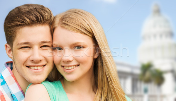 smiling couple over washington white house Stock photo © dolgachov