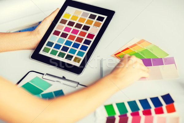 woman working with color samples for selection Stock photo © dolgachov