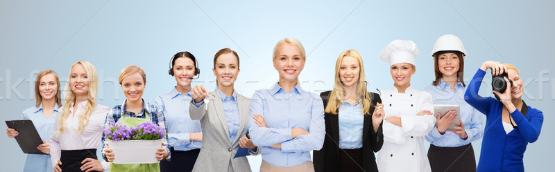 Fericit femeie de afaceri profesional muncitorii oameni profesie Imagine de stoc © dolgachov