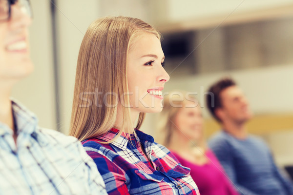 Grupo sorridente estudantes palestra ouvir educação Foto stock © dolgachov