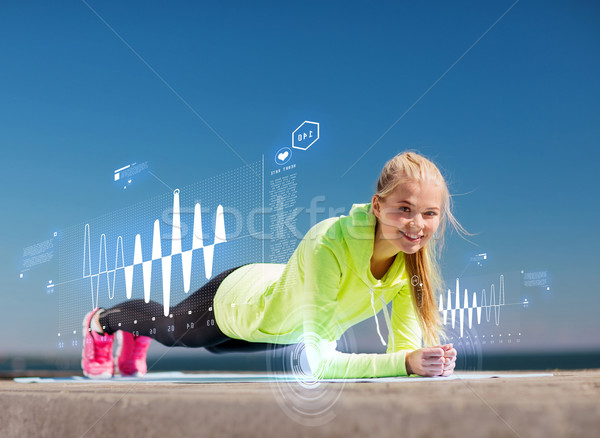 woman doing sports outdoors Stock photo © dolgachov