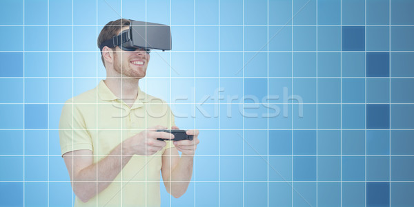 Stockfoto: Gelukkig · man · virtueel · realiteit · hoofdtelefoon · gamepad