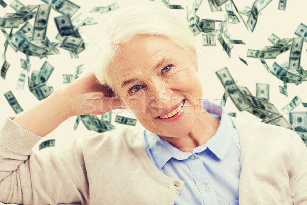 happy senior woman face over violet background Stock photo © dolgachov